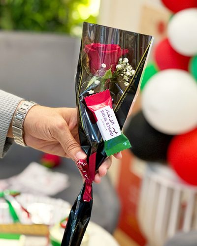 chocolate with uae falg printed with single flowers